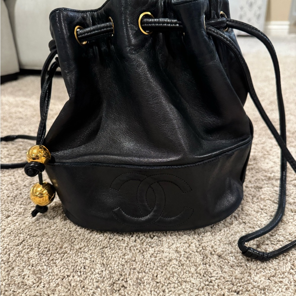 Chanel Lambskin Drawstring Black Leather Bag with Gold Accents
